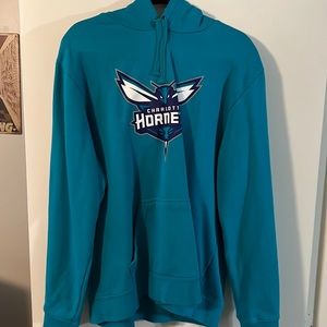 Worn twice Hornets pull over hoodie with front pocket.